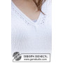 White Trail by DROPS Design - Patron de tricot pour chemisier taille S - XXXL