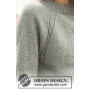 Sage Twist by DROPS Design - Patron de tricot pour chemisier taille S - XXXL